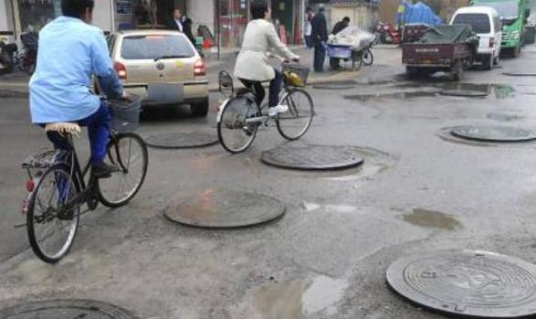 车主抱怨马路沙井盖设计不合理,专家却说:为了帮车主提神