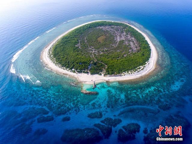 探访西沙甘泉岛:小岛美如翡翠 渔民居住点设施齐全