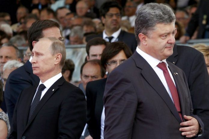 乌克兰总统抱怨普京拒绝对话 普京：我只是不想理他