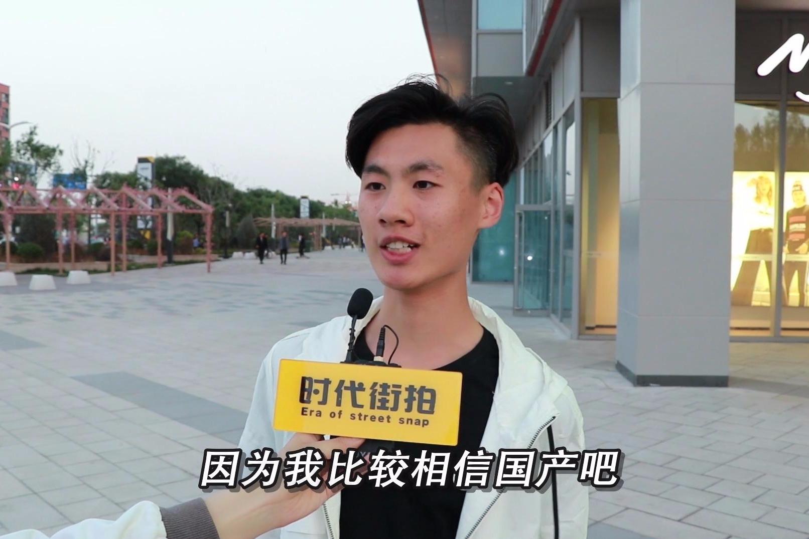 街头采访华为手机能超过苹果手机吗路人评价你觉得能吗