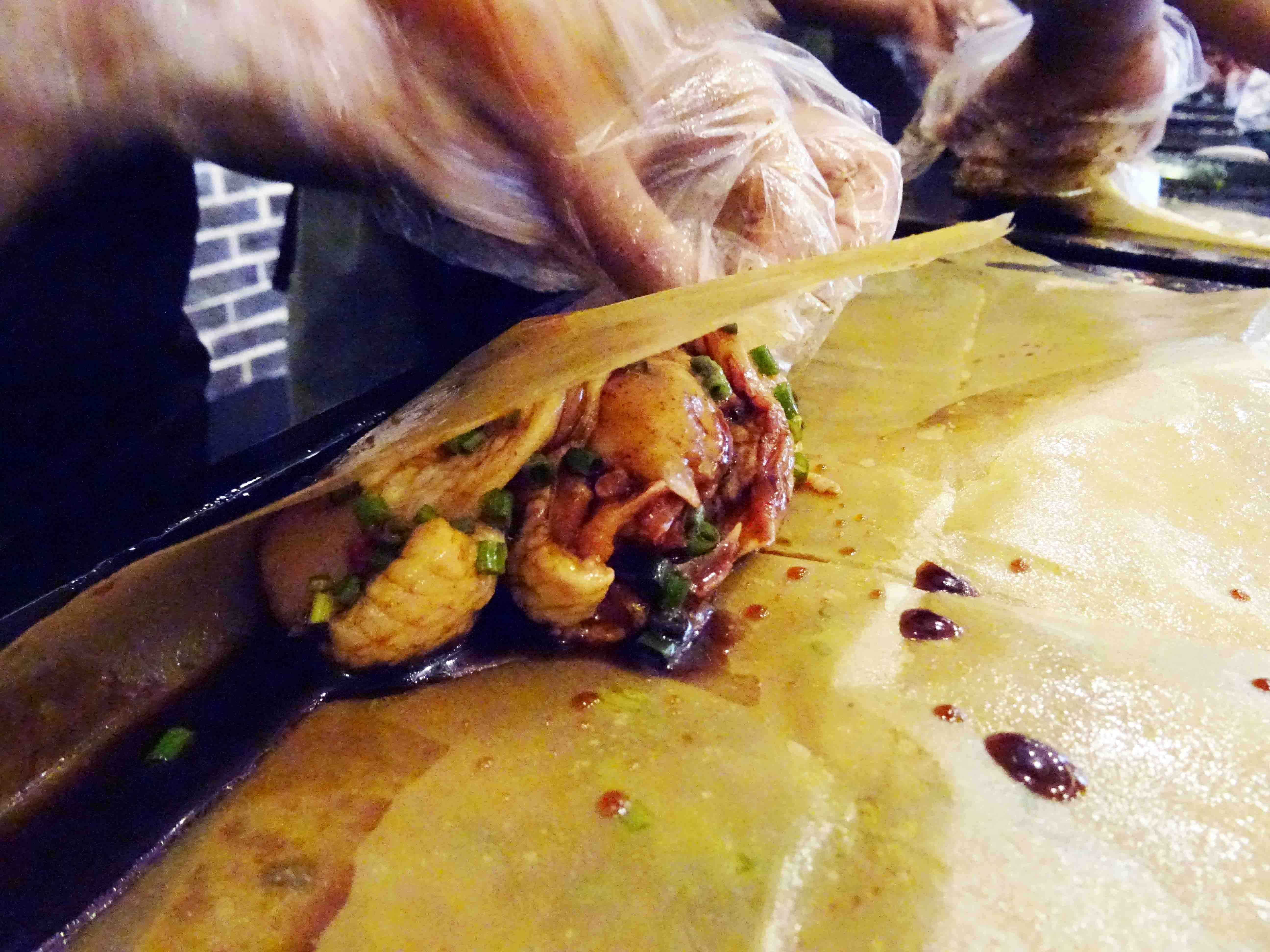 聚焦文化和自然遗产粤菜代表作纸包鸡活态流变成岭南特产