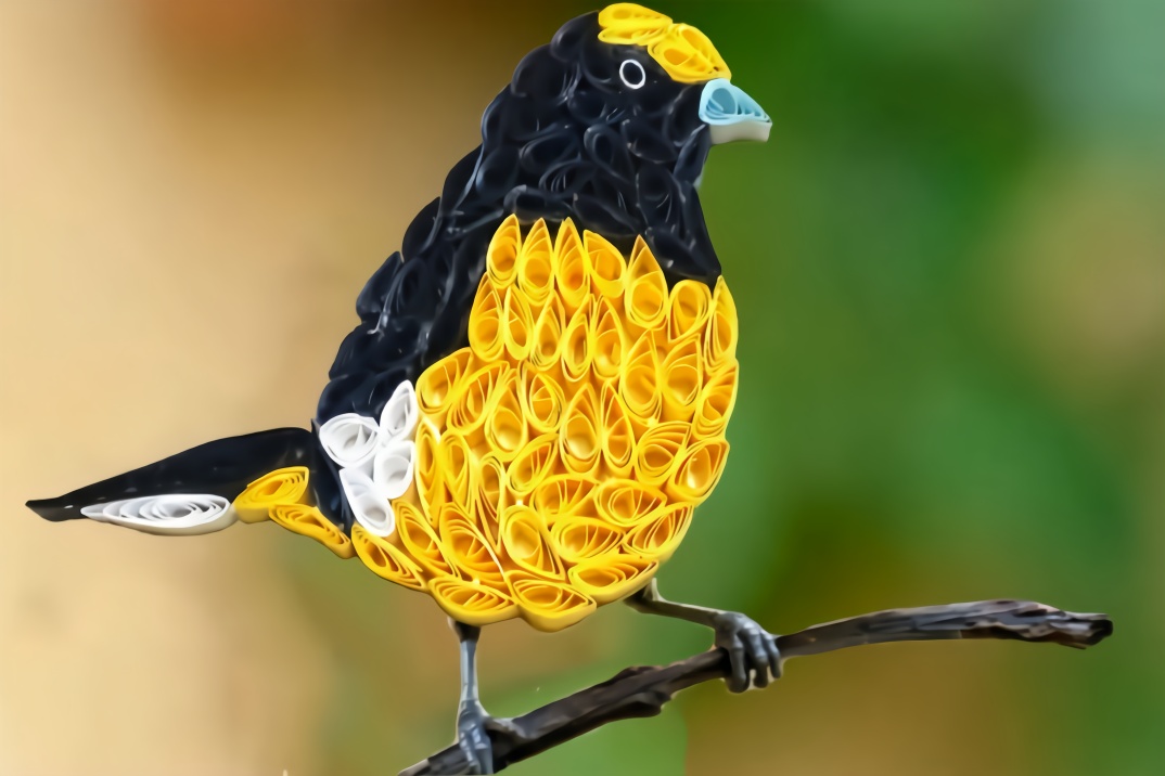 教你用彩纸制作美丽的黄色羽毛鸟手工教程